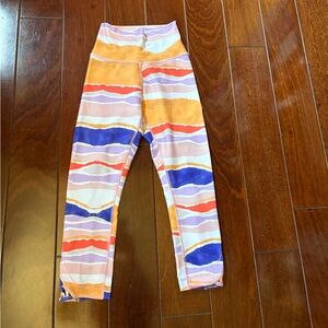 Lululemon Athletica Cropped Orange and Purple Leggings for Dynamic Comfort